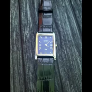 NOS Men's Silver Tank Blue Dial Black Strap Dress Watch New Mvt Batt