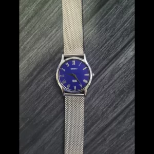 Rare Vintage Seiko Round Slim Roman Blue Dial Silver Mens Watch