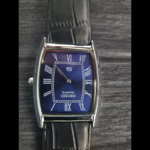Rare Mens Silver Barrel Tank Blue Dial Black Strap Dress Watch