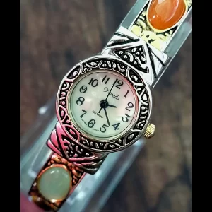 Rare Womens Xanadu Gem Bangle Mother of Pearl Dial Watch